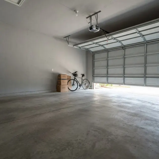 Bare gray concrete garage floor